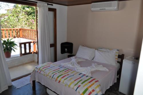 卡萨达斯罗萨斯旅馆客房内的一张或多张床位