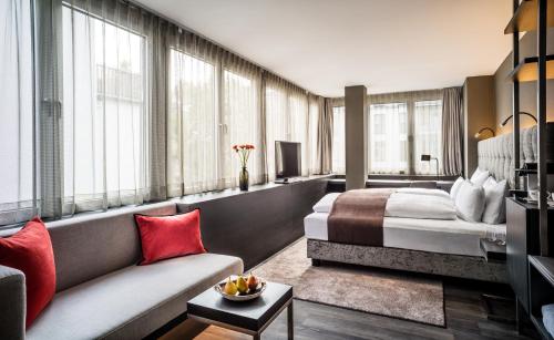 法兰克福萨克斯城市设计酒店客房内的一张或多张床位