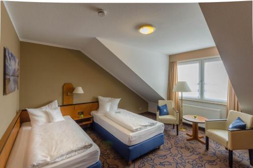 马克里伯格霍夫酒店客房内的一张或多张床位