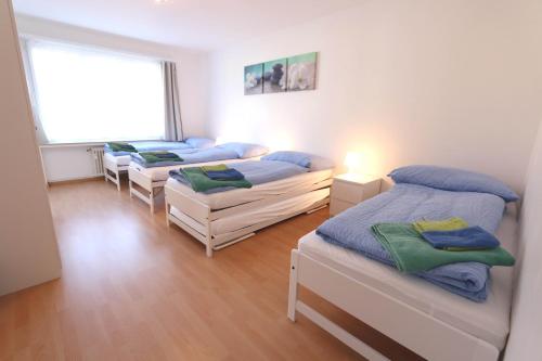 Apartment Bünda客房内的一张或多张床位