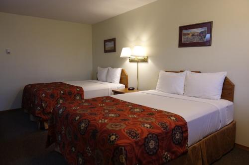 Armada Inn Motel客房内的一张或多张床位