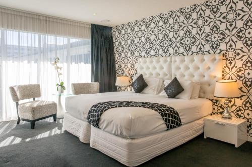罗托鲁瓦丽晶精品酒店 客房内的一张或多张床位