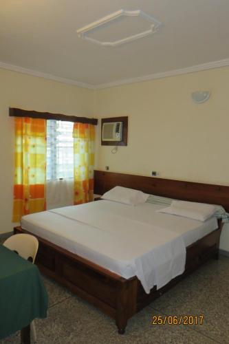Hotel Agbeviade客房内的一张或多张床位