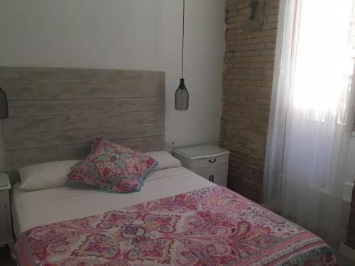 瓦伦西亚中心罗夫特佐纳佩奇纳公寓客房内的一张或多张床位
