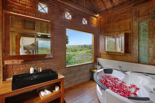 巴厘岛狄阿莫酒店的一间浴室