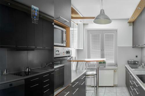 Apartamenty-VIP的厨房或小厨房