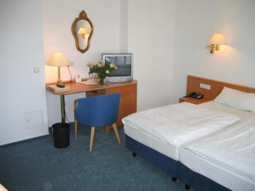 多特蒙德吉尔登霍夫韦斯特佛尔伦哈伦酒店客房内的一张或多张床位