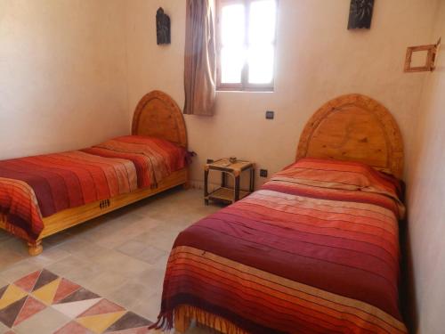 Borj Biramane客房内的一张或多张床位