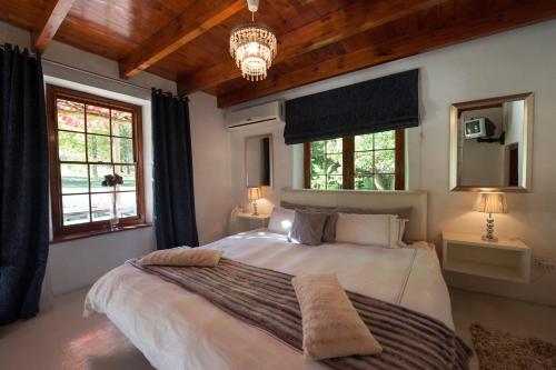 De Kloof Heritage Estate Hotel and Wellness客房内的一张或多张床位