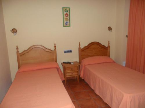 Hotel Rural La Encina客房内的一张或多张床位