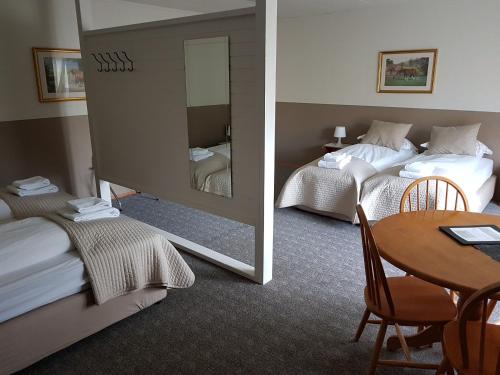 翁古尔斯塔迪尔兰姆酒店客房内的一张或多张床位