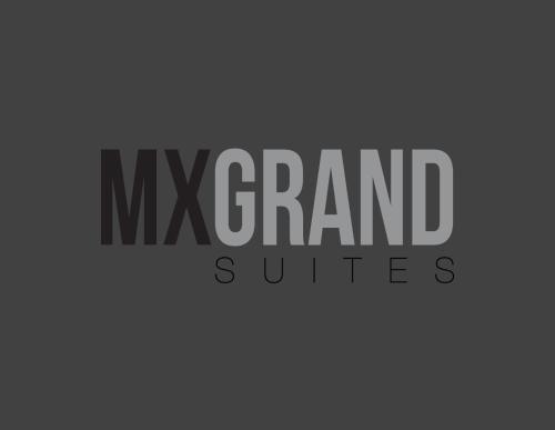 墨西哥城MX格兰德套房公寓式酒店的读nx超豪华套房的标志
