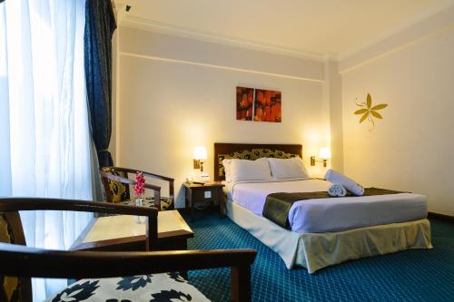 马来西亚马六甲赛丽酒店客房内的一张或多张床位
