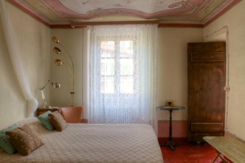 狄蒙拉圣塞巴斯堤亚诺酒店客房内的一张或多张床位