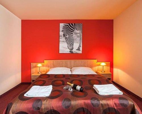 Hotel Paola客房内的一张或多张床位
