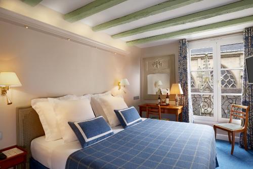 卢浮驿站酒店客房内的一张或多张床位