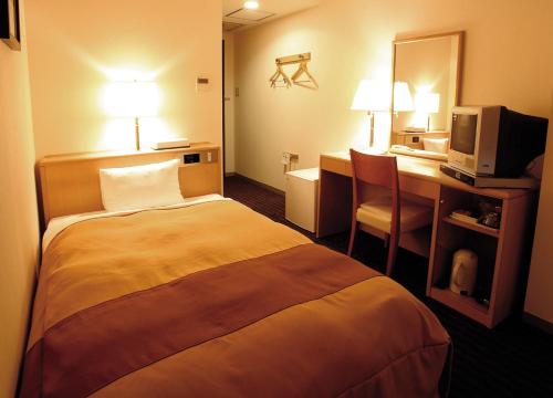 弘前广场酒店 客房内的一张或多张床位