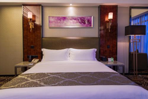 深圳中天美景大酒店(宝安国际机场西乡地铁站店)客房内的一张或多张床位