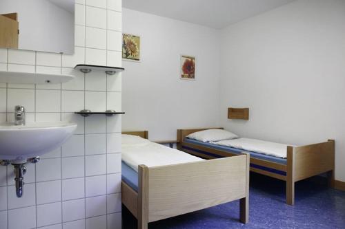 弗赖堡朱根赫伯格酒店客房内的一张或多张床位