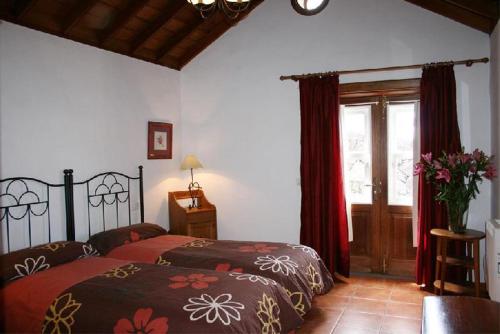 Casa Rural La Caldera客房内的一张或多张床位