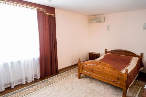 Belovezhskaya pushcha Hotel №2客房内的一张或多张床位
