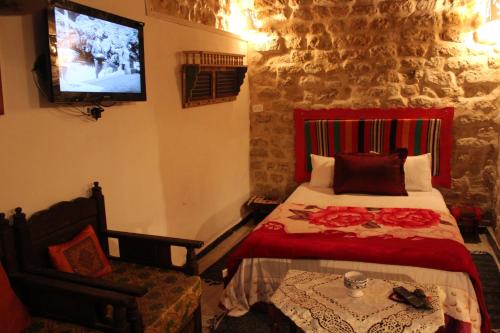 Dar kenza Tunis客房内的一张或多张床位