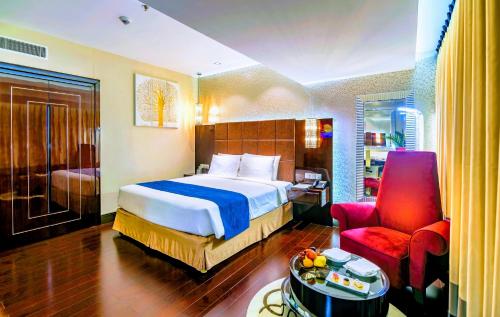 The Raintree Dhaka - A Luxury collection Hotel客房内的一张或多张床位