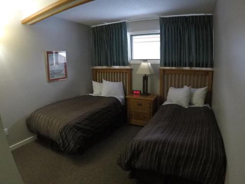 豪瑟蒂芙全景度假酒店客房内的一张或多张床位