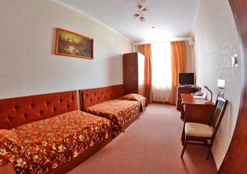 Afina Hotel客房内的一张或多张床位