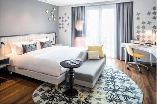 法兰克福辉盛凯贝丽酒店式服务公寓客房内的一张或多张床位