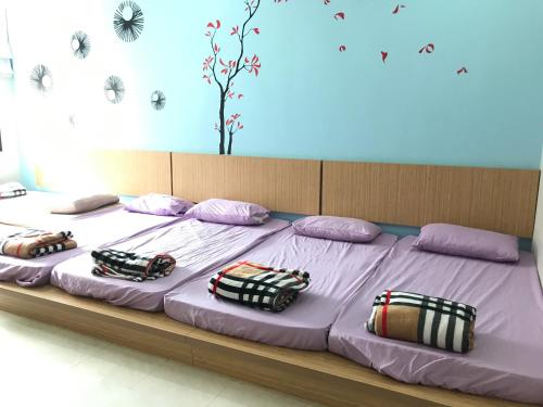 Jiaxin Homestay - Desa Terbau 家馨民宿客房内的一张或多张床位
