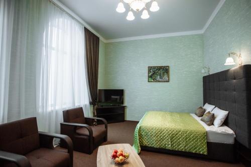 Отель БЕССАРАБИЯ客房内的一张或多张床位