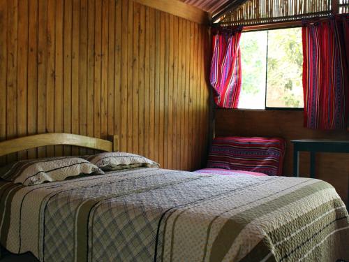 Oasis Paraiso Ecolodge客房内的一张或多张床位