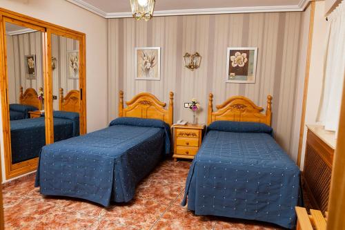 瓜达尔基维尔酒店客房内的一张或多张床位