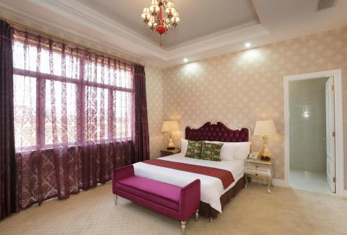 President Hotel at Umodzi Park客房内的一张或多张床位