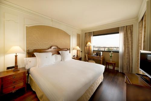 塞维利亚中心酒店客房内的一张或多张床位