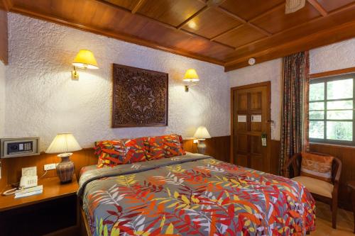 Tropica Bungalow Beach Hotel客房内的一张或多张床位