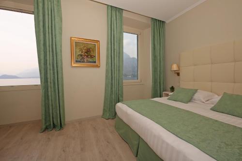 Hotel Du Lac & SPA客房内的一张或多张床位