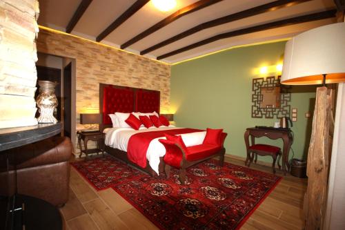 迈措翁奢华精品酒店客房内的一张或多张床位
