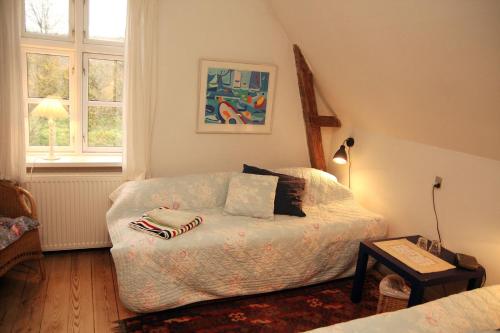 哥本哈根威尔斯住宿加早餐旅馆的卧室配有一张床