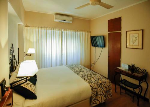 Hotel Palmar客房内的一张或多张床位