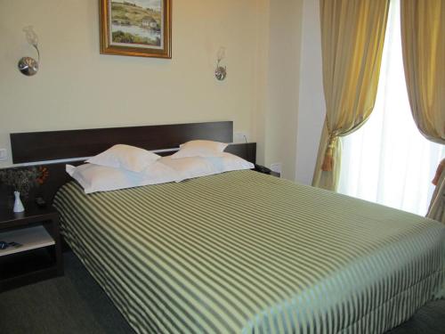 Hotel Kilometrul Zero客房内的一张或多张床位