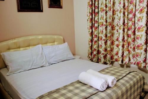 峇六拜巴扬民宿的床上有两条毛巾
