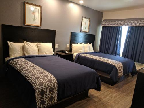 美国最佳价值旅馆 - 布朗斯维尔汽车旅馆客房内的一张或多张床位