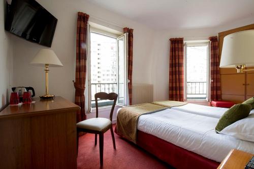 法兰西埃菲尔酒店客房内的一张或多张床位