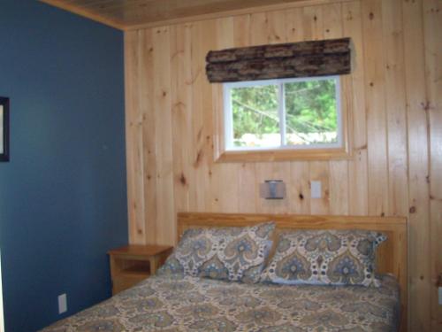 Lakewoods Cottage客房内的一张或多张床位