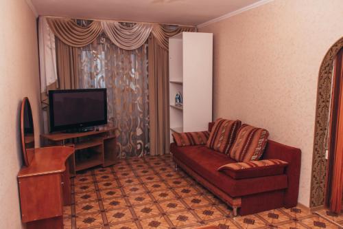 Apartment "Berloga 55" na Ordzhonikidze的休息区
