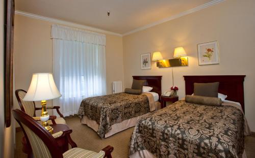 Hotel Amari客房内的一张或多张床位