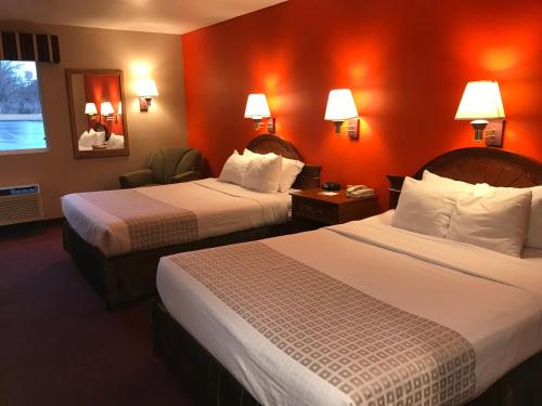 雪松城美洲最佳价值旅馆客房内的一张或多张床位