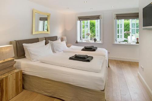 Landhaus Treskersand客房内的一张或多张床位